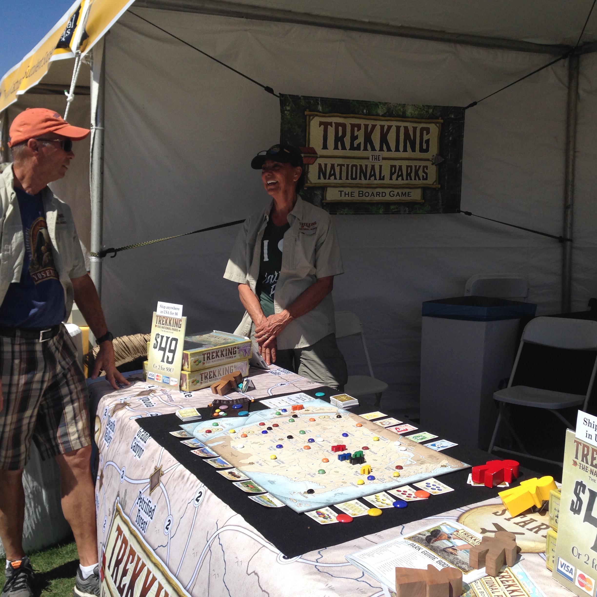 The Binkele Family at their booth where they are selling their Mensa award winning board game about trekking the national parks. 