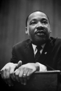 Photo of Martin Luther King leaning on lectern in 1964. Originally from http://hdl.loc.gov/loc.pnp/pp.print sharpened for wiki use. 