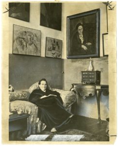 Gertrude_Stein_sitting_on_a_sofa_in_her_Paris_studio_-_Library_of_Congress.tif