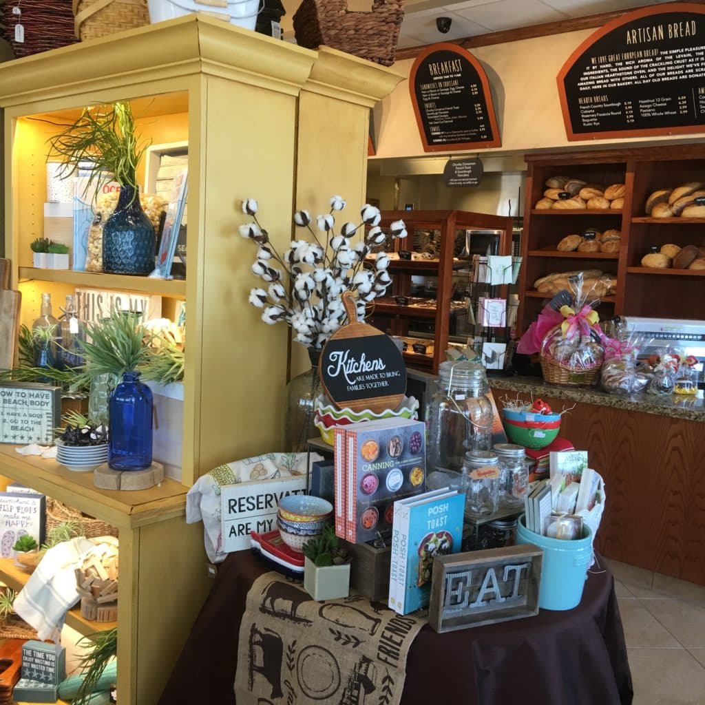 View of Kneaders counter area showing gift items, gift baskets, breakfast and bread (and so much more!)
