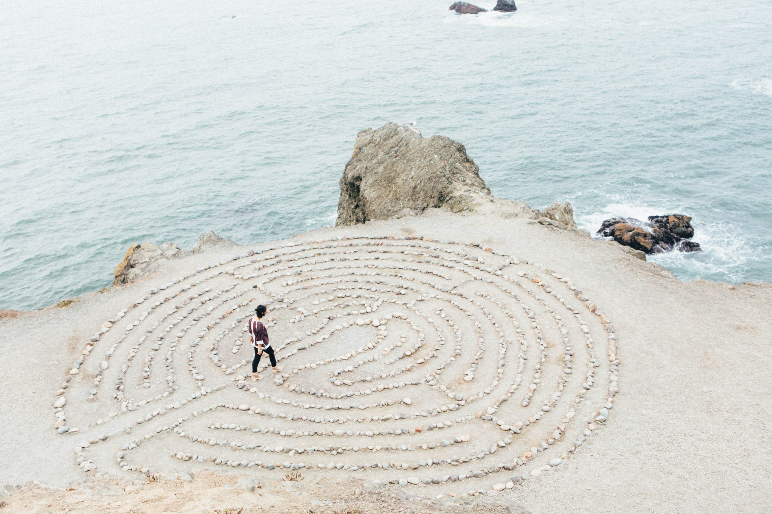 labyrinth on the beach by Ashley Batz on Unsplash.